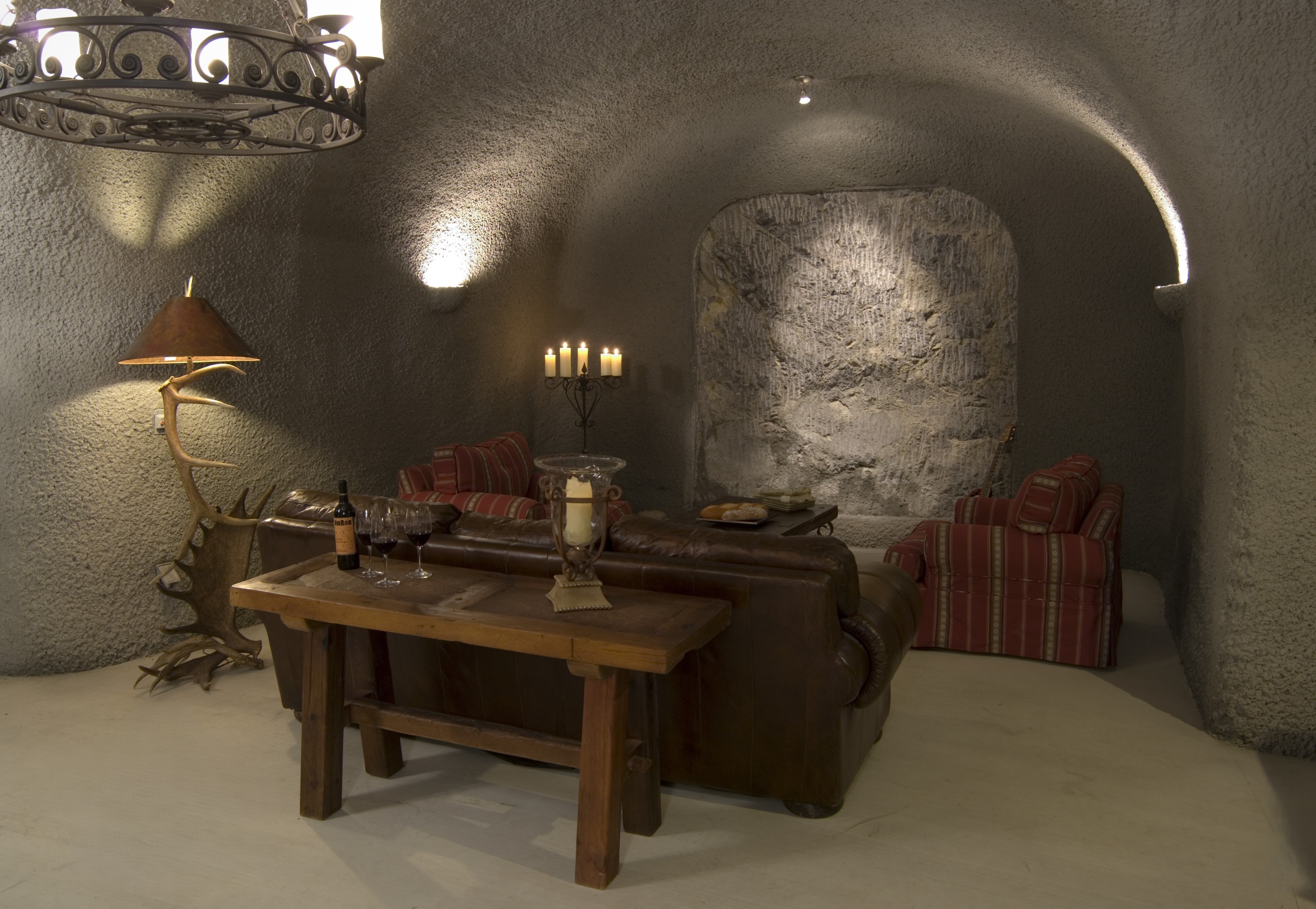 Lounge framed by a curved stone arch